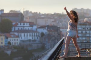 Female tourist in Porto, Portugal in summer